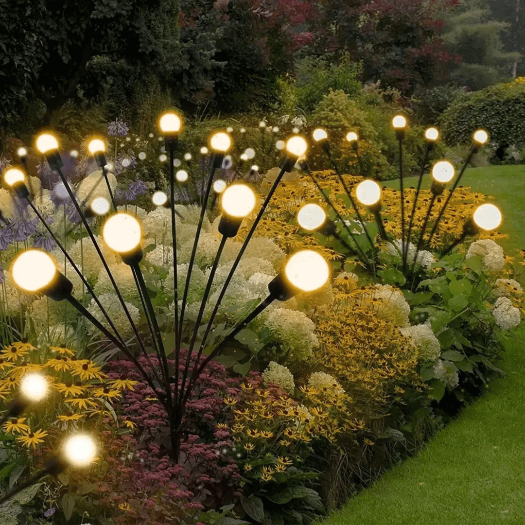 "Lampe solaire extérieure effet luciole, design écologique, lumière douce et chaleureuse, idéale pour jardins et terrasses."