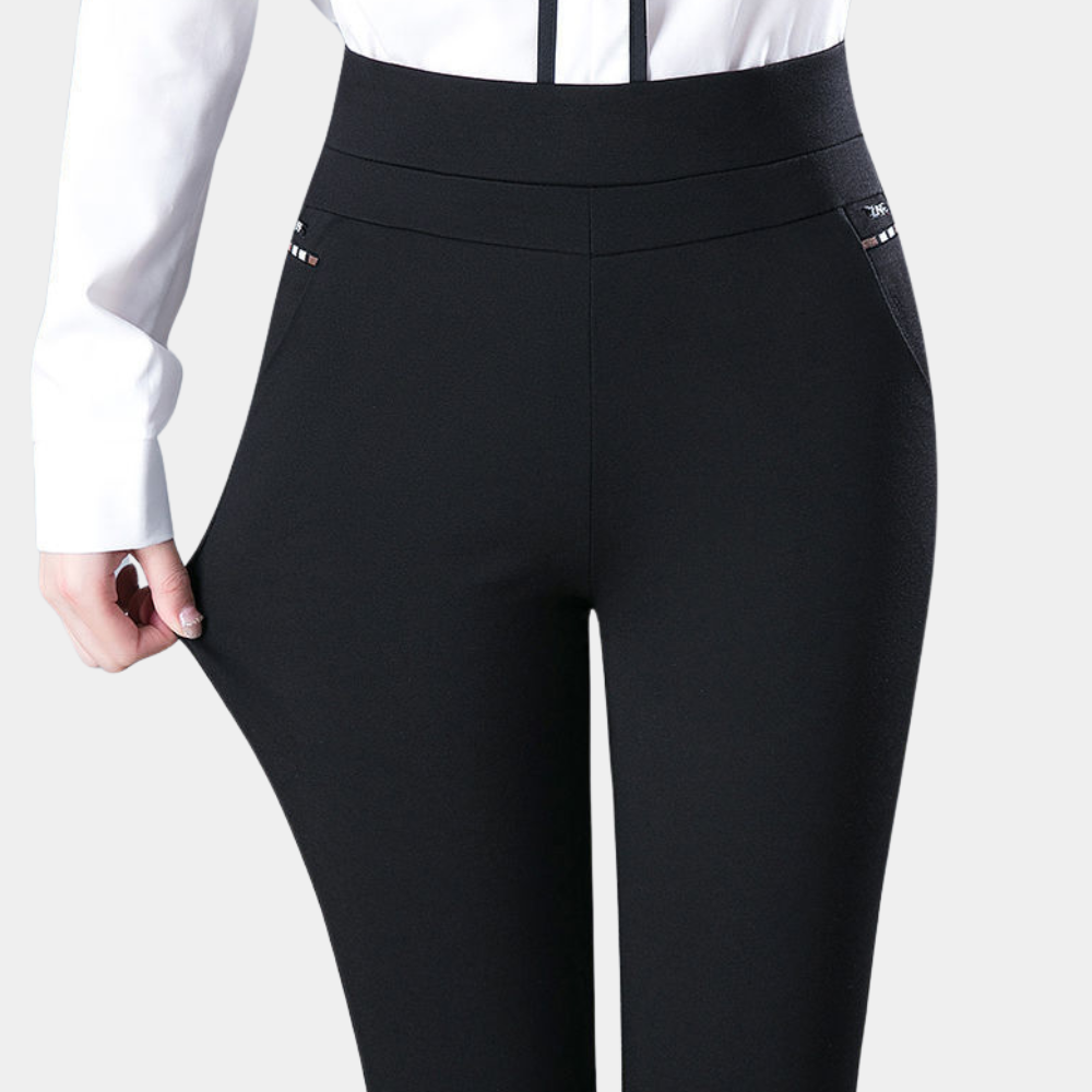 Legging femme noir ultra confortable et extensible, idéal pour yoga, sport et quotidien actif.