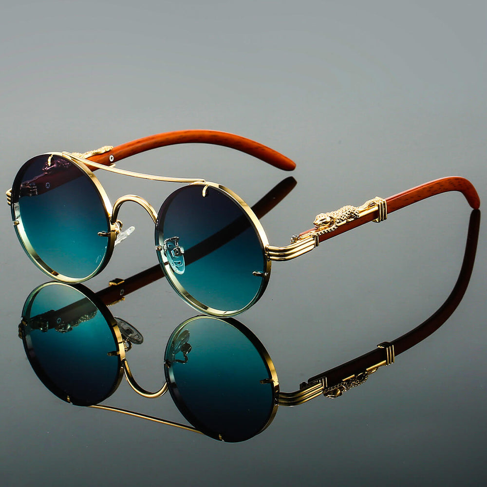 "Lunettes de soleil homme rétro ovales métalliques, protection UV, bleu foncé, élégantes et sophistiquées"