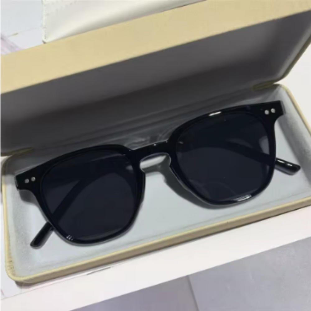 Lunettes de soleil polarisées UV400 élégantes pour hommes et femmes, offrant protection et confort optimal en extérieur.