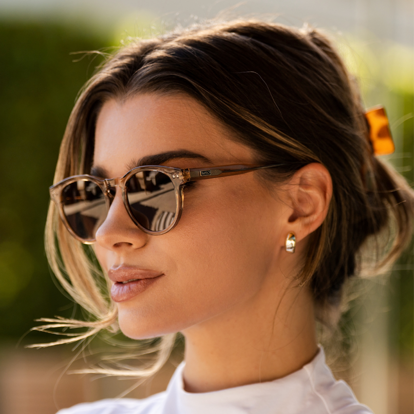 Lunettes rondes femme, polarisées, UV.  Protection solaire optimale, style rétro chic.