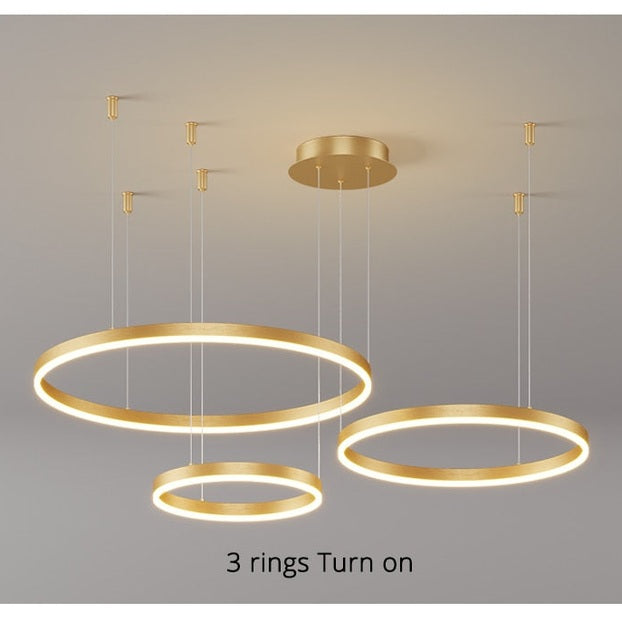 Lustre LED rond, design moderne.  Anneaux lumineux, éclairage doux & homogène pour salon ou salle à manger.