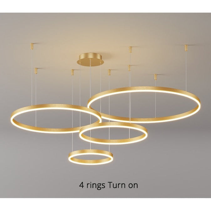 Lustre LED rond, design moderne.  Anneaux lumineux, éclairage doux & homogène pour salon ou salle à manger.
