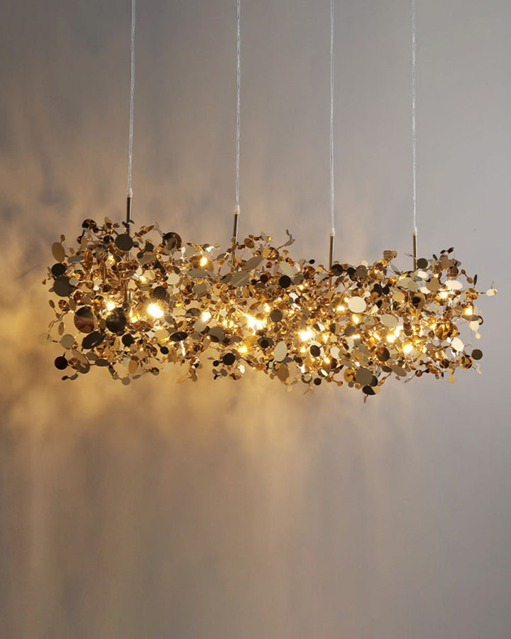 Lustre suspendu moderne, design nuage métallique argent/or. Luminaire élégant et aérien.