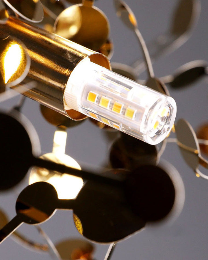 Lustre suspendu moderne, design nuage métallique argent/or. Luminaire élégant et aérien.