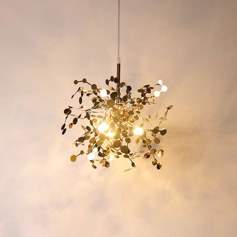 Lustre suspendu moderne, design nuage métallique argent/or. Luminaire élégant et aérien.