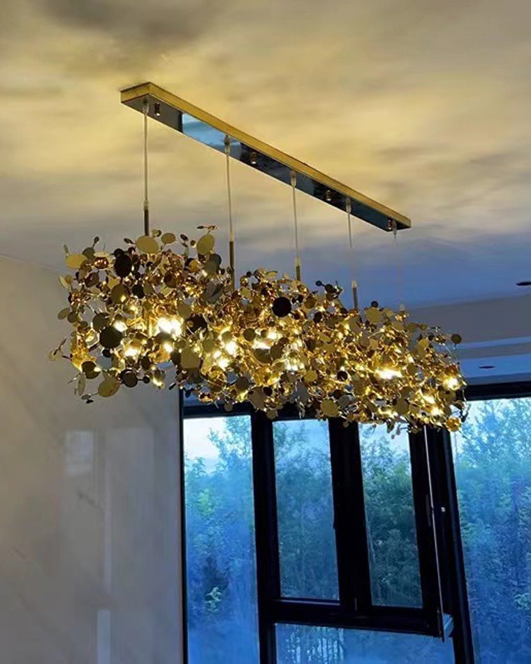 Lustre suspendu moderne, design nuage métallique argent/or. Luminaire élégant et aérien.