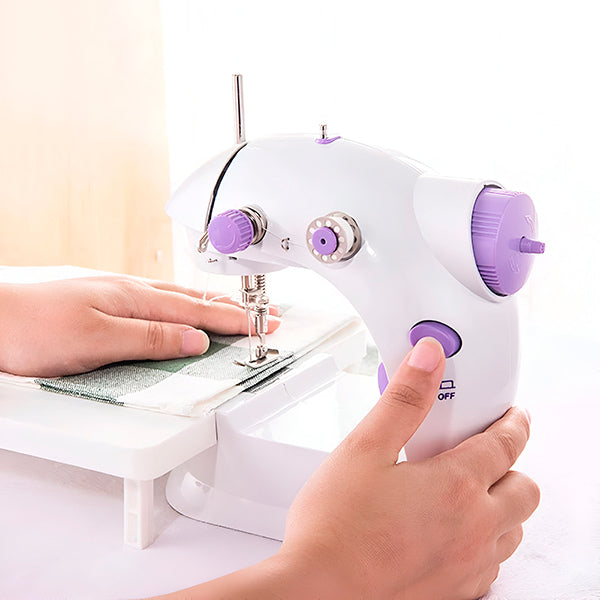 Machine à coudre compacte, couture facile et précise. Idéale pour débutants et experts.  Design élégant et fonctionnel.