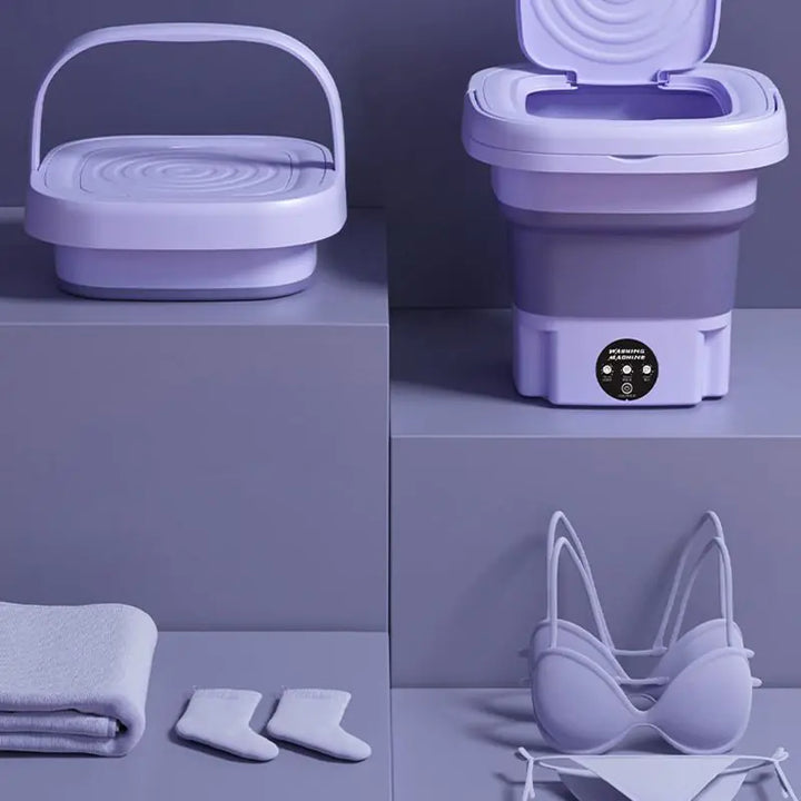 Machine à laver portable pliable. Lavage efficace et compact, idéal pour petits espaces. Gain de place garanti.