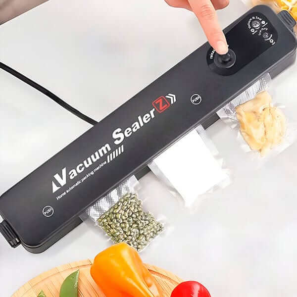 "Machine sous vide compacte et moderne sur plan de travail pour scellage aliments, conservation fraîcheur optimale en cuisine