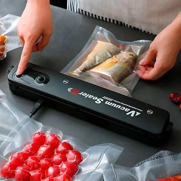"Machine sous vide compacte et moderne sur plan de travail pour scellage aliments, conservation fraîcheur optimale en cuisine