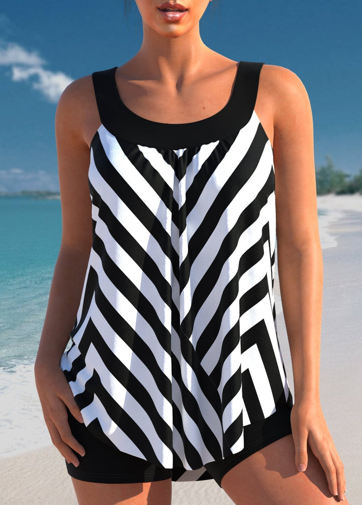 "Maillot de bain femme à pois, style classique et chic, fond blanc avec pois noirs, coupe flatteuse et élégante."