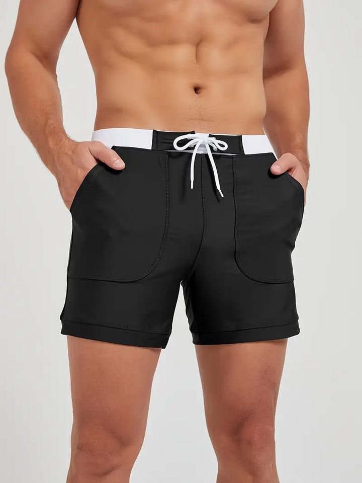 "Maillot de bain homme, séchage rapide, design moderne et élégant, couleur vive, parfait pour plage ou piscine."
