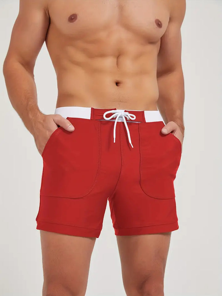 "Maillot de bain homme, séchage rapide, design moderne et élégant, couleur vive, parfait pour plage ou piscine."