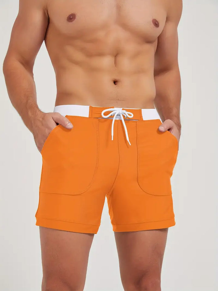 "Maillot de bain homme, séchage rapide, design moderne et élégant, couleur vive, parfait pour plage ou piscine."