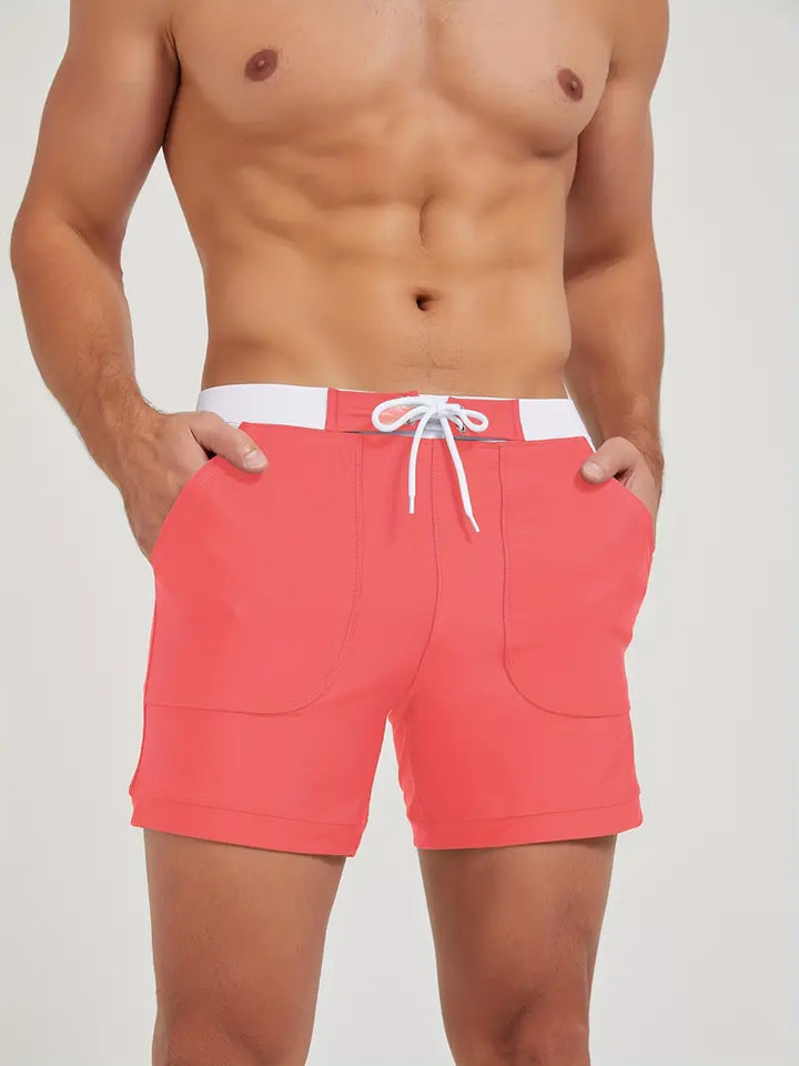 "Maillot de bain homme, séchage rapide, design moderne et élégant, couleur vive, parfait pour plage ou piscine."