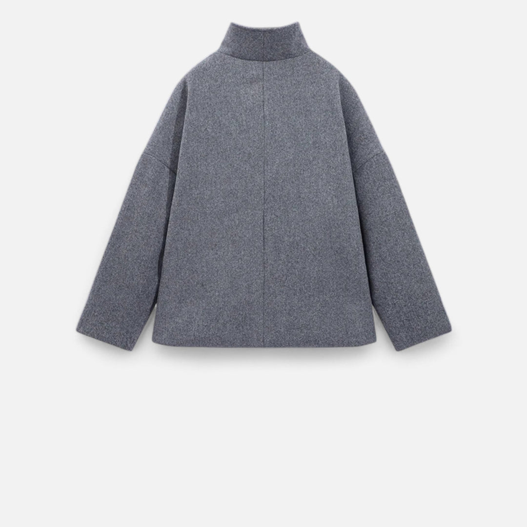 Manteau hiver femme élégant, coupe ample, double boutonnage, confort et style.