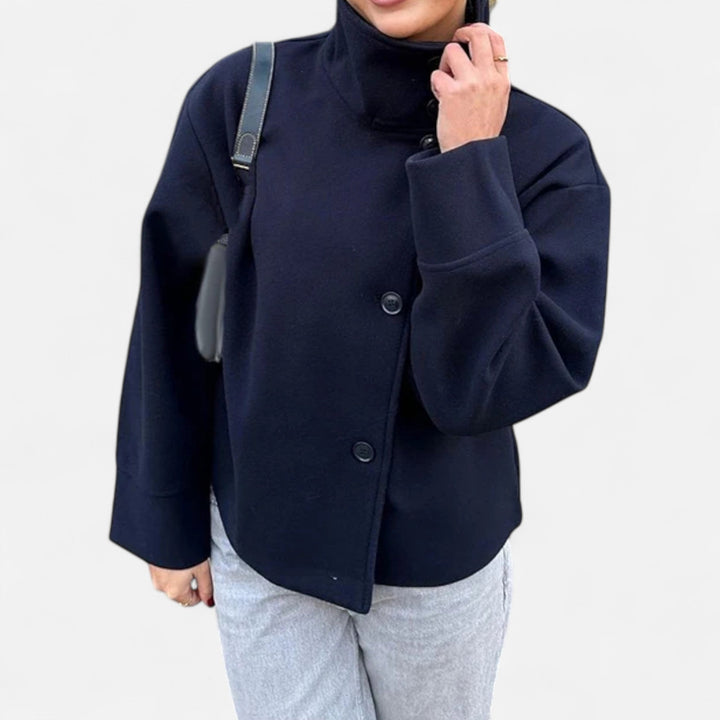 Manteau court femme élégant, col montant, double boutonnage, style hiver.