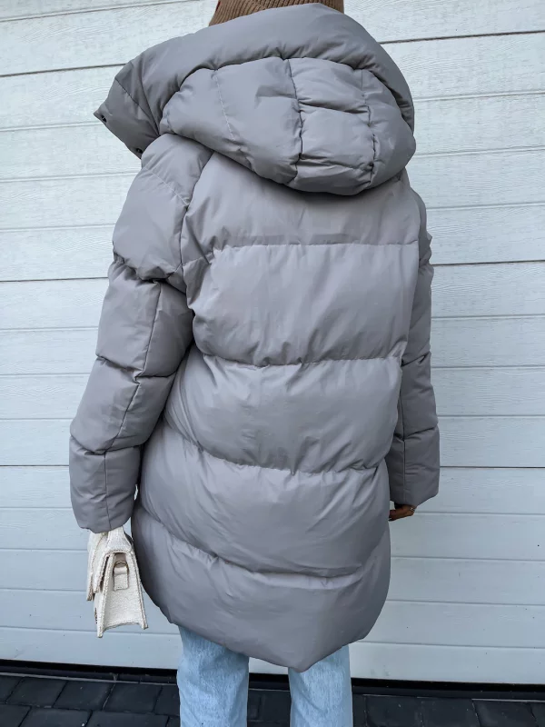 Élégant manteau d'hiver femme long, chaud et confortable, avec capuche et fermeture éclair. Idéal parka grand froid.
