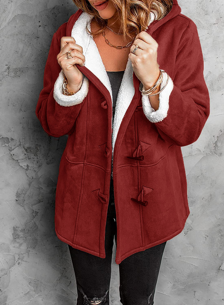 Pardessus femme chaud avec capuche pour l'hiver, style moderne et protection contre le froid intense.