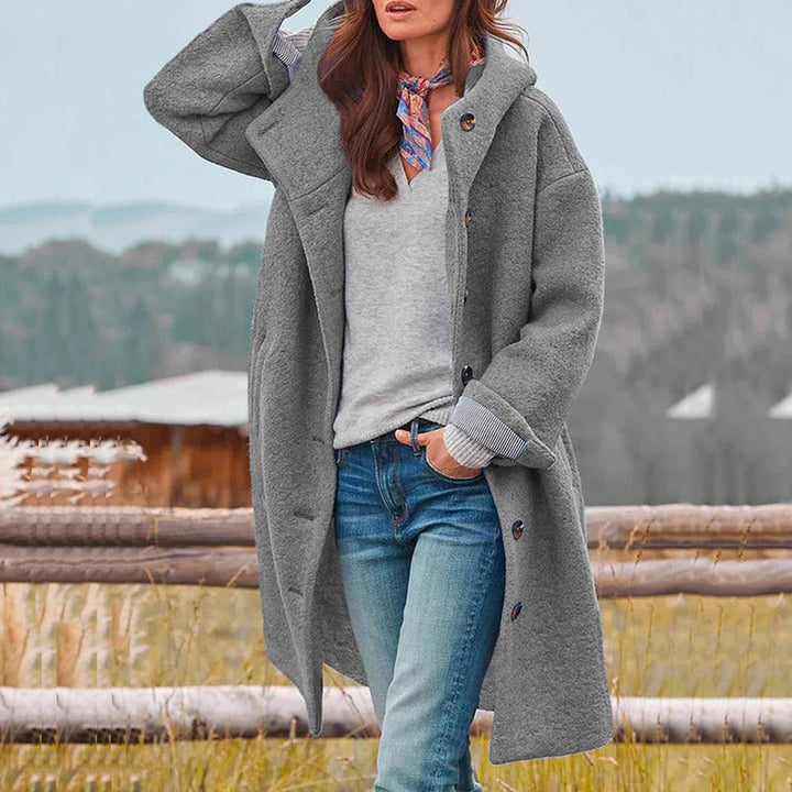 Manteau femme hiver stylé, coloris vert, bleu ou noir, parfait pour rester au chaud avec élégance.
