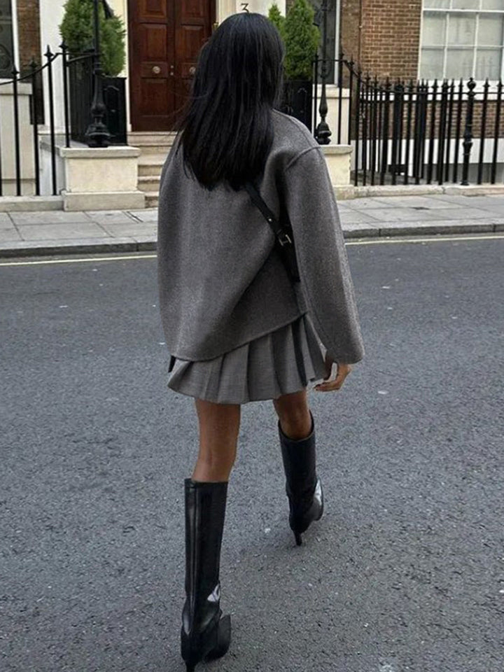 "Manteau femme élégant à boutons, coupe décontractée en peluche, couleurs variées; parfait pour automne/hiver."