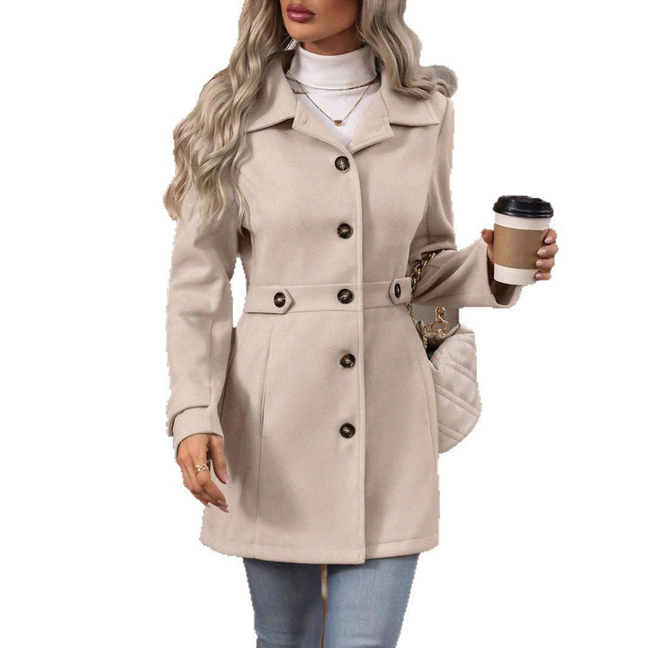 Manteau femme automne-hiver, élégant, mi-long. Boutonnage simple, revers, confortable pour look chic.