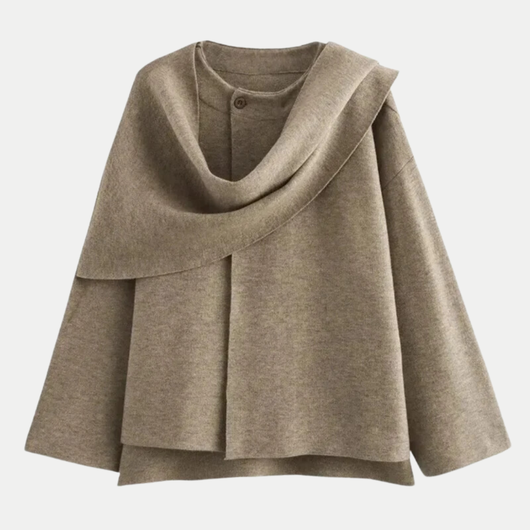 Manteau femme asymétrique chic et moderne à ourlet fendu. Idéal pour les tendances mode automne-hiver.
