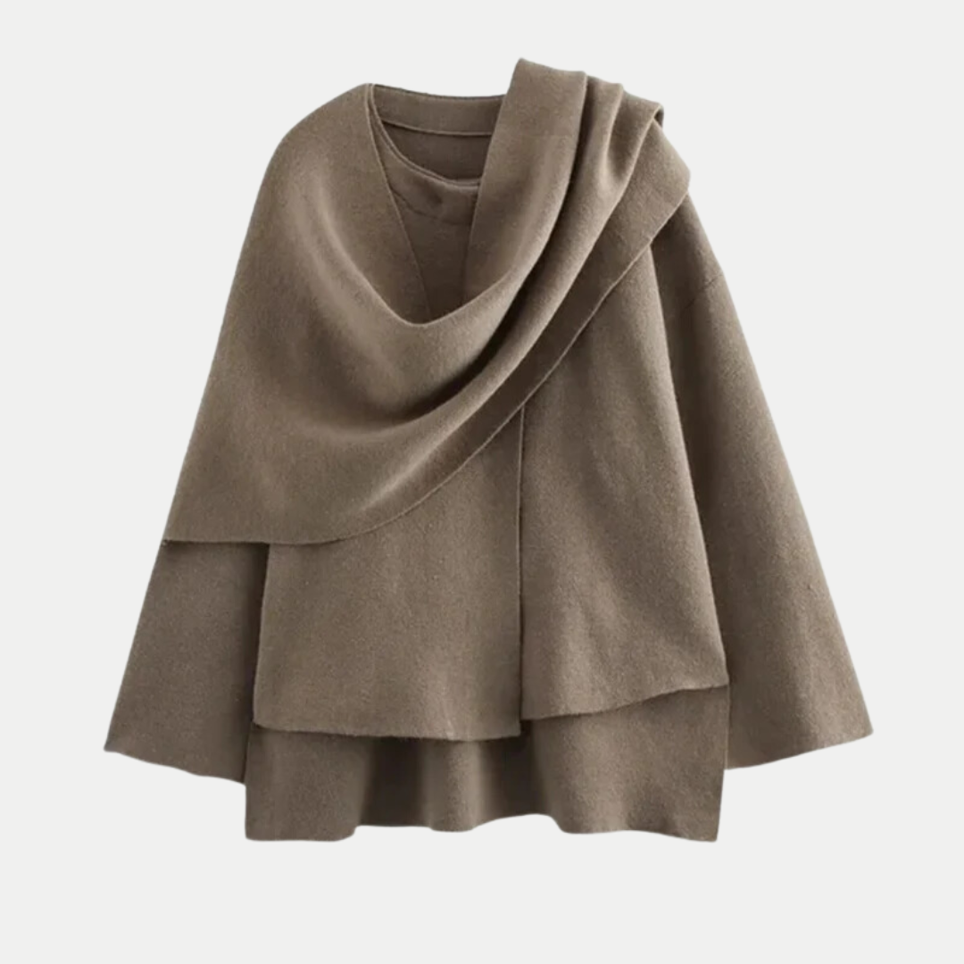 Manteau élégant pour femme avec ourlet fendu et coupe polyvalente. Confort et style moderne pour l'hiver.