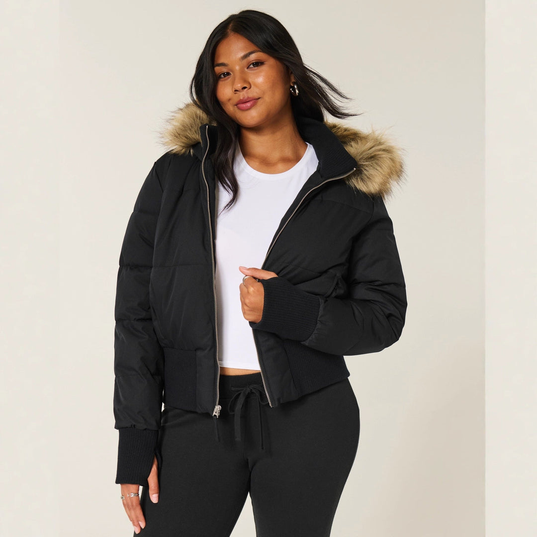 Manteau d'hiver femme Helena ultra chaud. Capuche amovible et col fourrure pour s'adapter à toutes les tenues urbaines.
