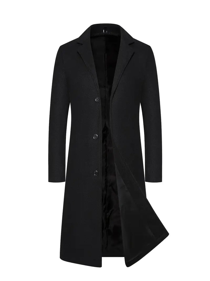 Manteau long ajusté homme noir, élégant et chic pour l'hiver. Vêtement masculin sophistiqué pour la mode automne.