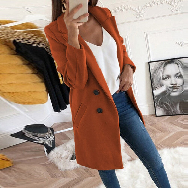 Manteau hiver femme coupe longue, tissu doux et chic, parfait pour rester au chaud avec élégance.