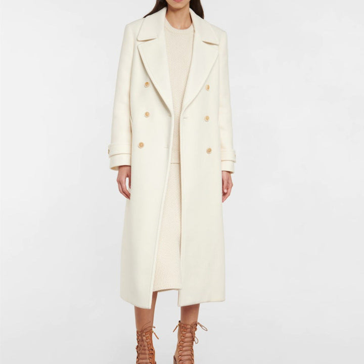 Manteau long croisé élégant pour femme, idéal automne/hiver. Vêtement extérieur chic et intemporel.