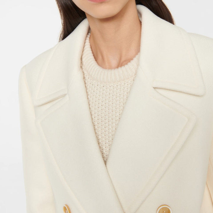 Manteau femme long et sophistiqué, style croisé intemporel. Parfait pour l'automne et l'hiver.