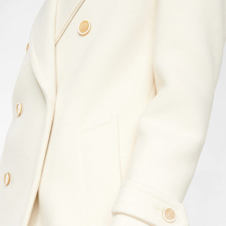 Manteau long femme, design croisé chic. Vêtement élégant et sophistiqué pour l'hiver, style intemporel.