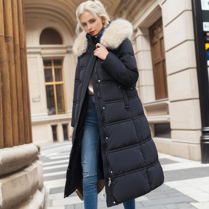 Manteau long femme tendance et chic, matelassé, avec somptueux col fourrure, parfait pour l'hiver.