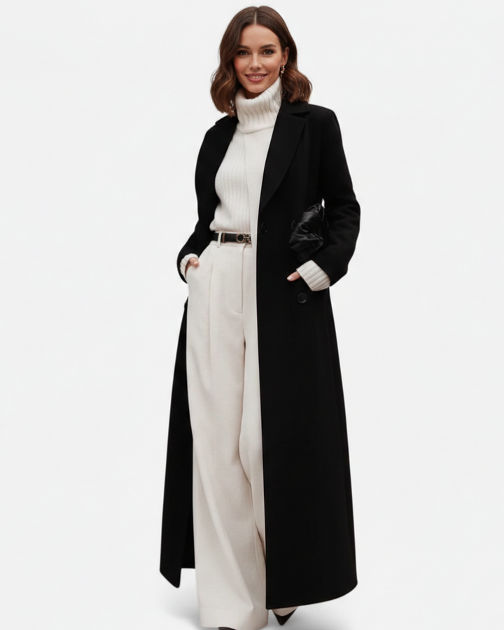Manteau trench noir classique femme, parfait pour une tenue professionnelle ou chic en automne-hiver.