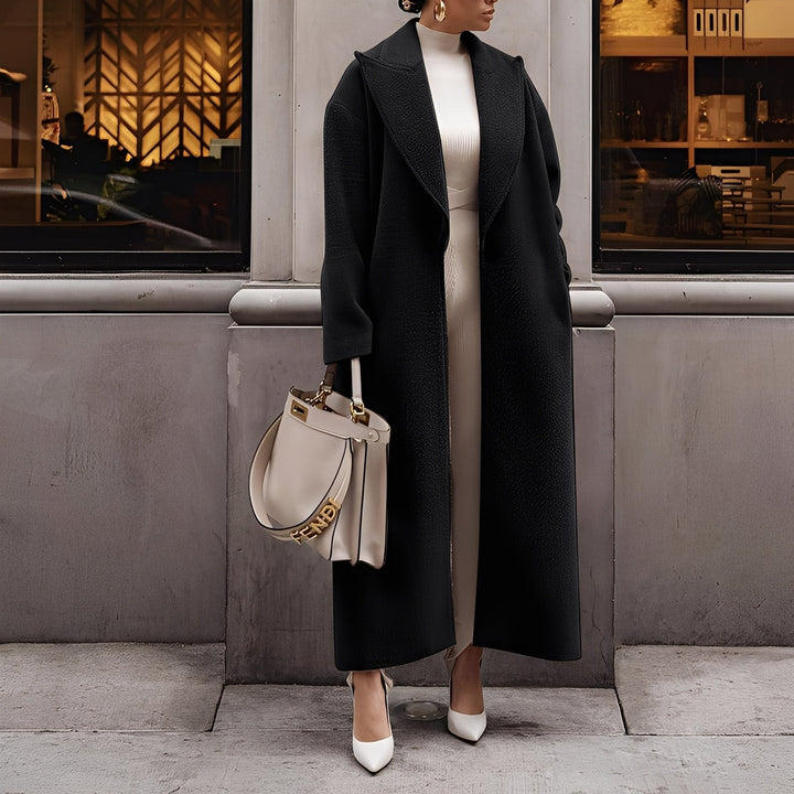 Manteau long femme, design oversize chic avec bouton unique. Veste hiver confortable et élégante, coupe ample.