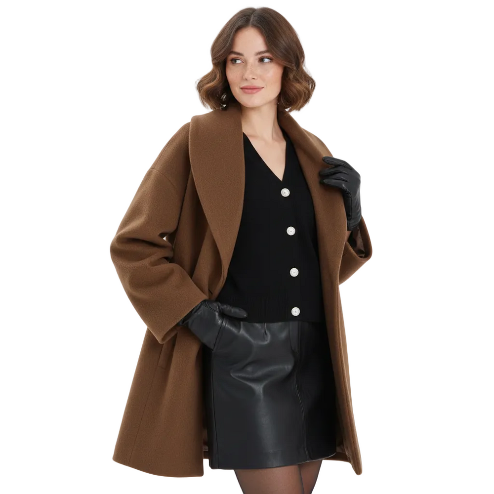 Veste longue femme chic avec revers larges, style tendance et confortable pour la saison automne-hiver.