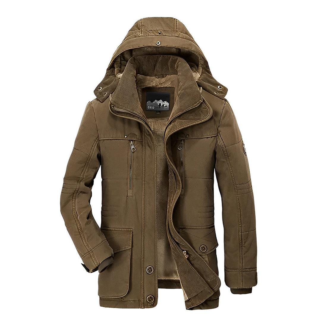 Texture du manteau parka hiver homme, matière résistante offrant chaleur et protection contre le froid.