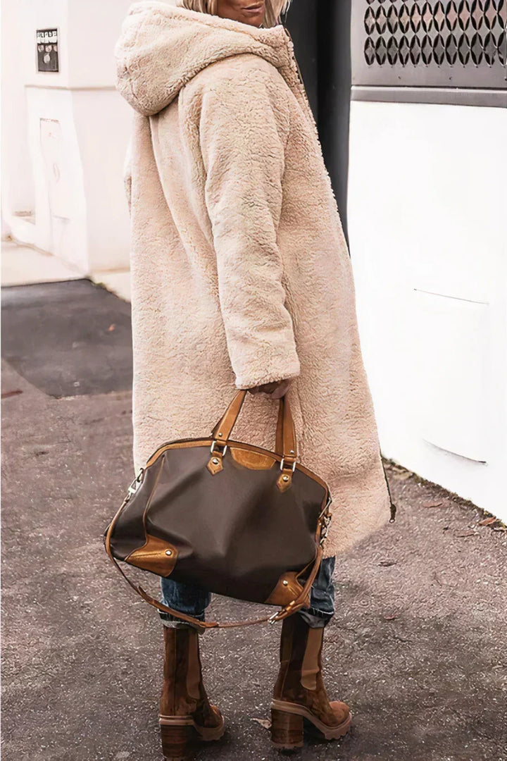 Manteau élégant pour femme, idéal pour le bureau ou une soirée. Chaleur et style garantis en hiver.