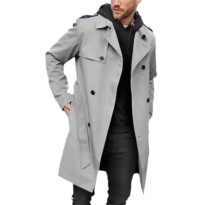 "Manteau trench homme coupe ajustée, double boutonnage, ceinture intégrée, tissu respirant, couleur classique."