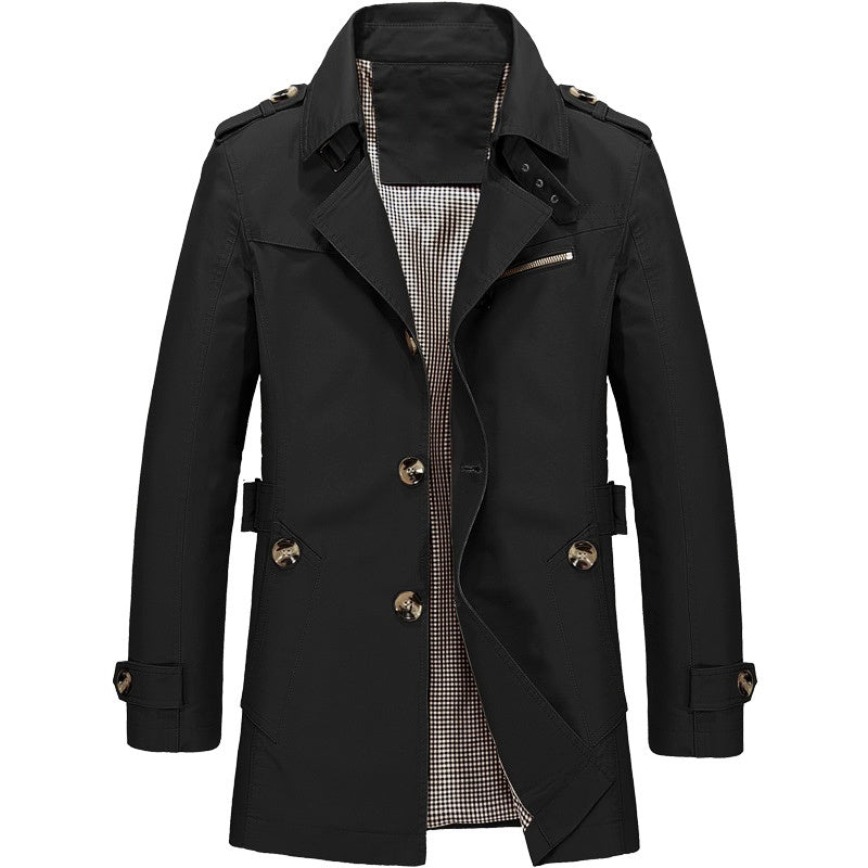 "Manteau trench homme élégant avec coupe structurée, doublure lisse, épaulettes marquées et style croisé sophistiqué."