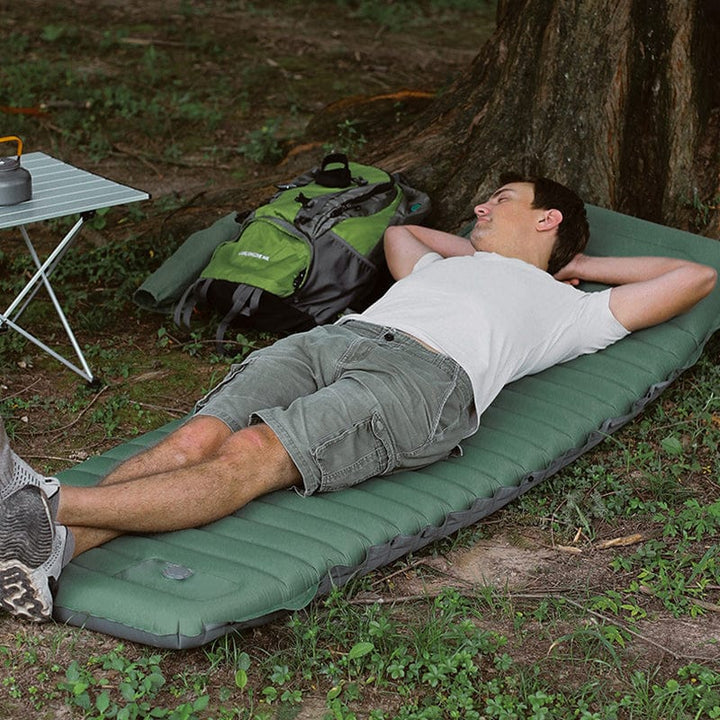Matelas gonflable premium avec coussin intégré. Confort optimal pour une nuit paisible, camping ou voyage.
