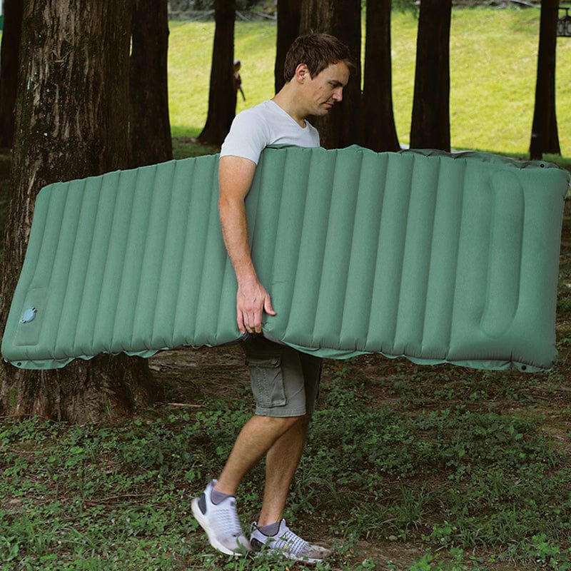 Matelas gonflable premium avec coussin intégré. Confort optimal pour une nuit paisible, camping ou voyage.