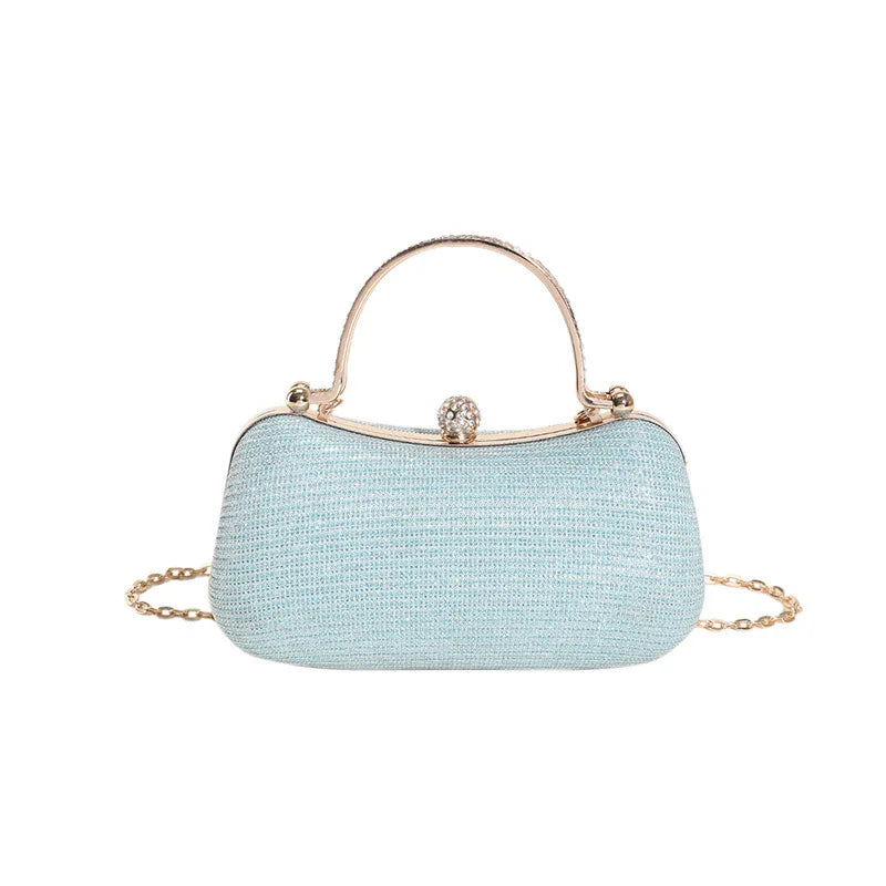Sac à main de cérémonie bleu marine pour femme, minaudière scintillante avec fermeture sécurisée.