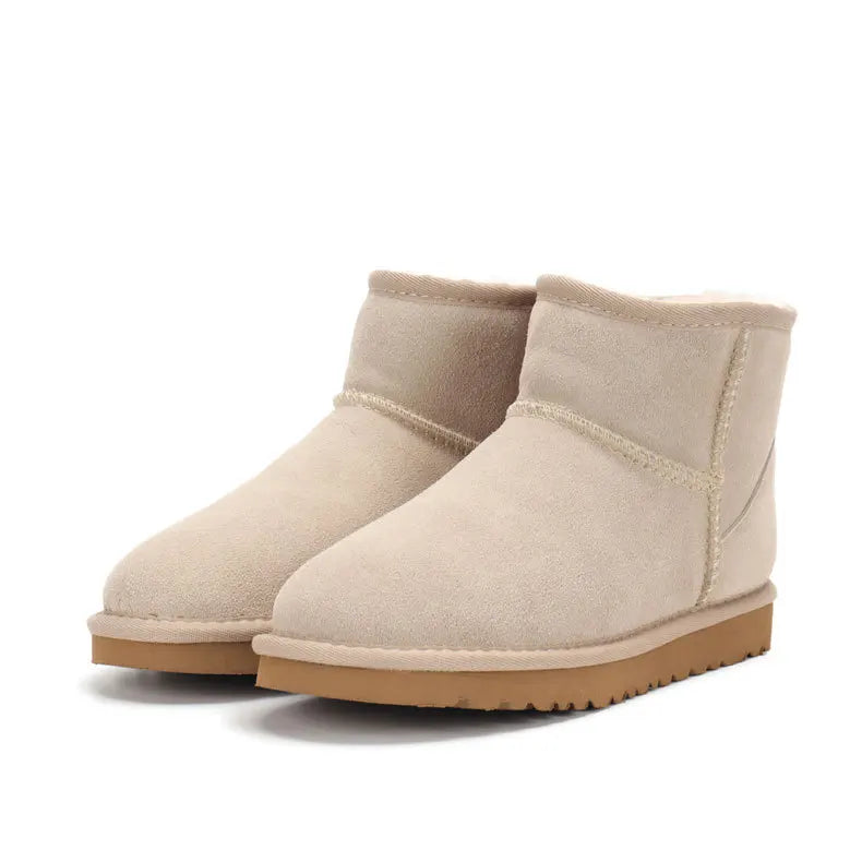 Chaussures d'hiver femme : mini-bottes Boston en peau de mouton, ultra confortables et chaudes.