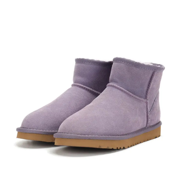 Mini-bottes Boston élégantes pour femmes, en cuir robuste et doublure peau de mouton pour l'hiver.