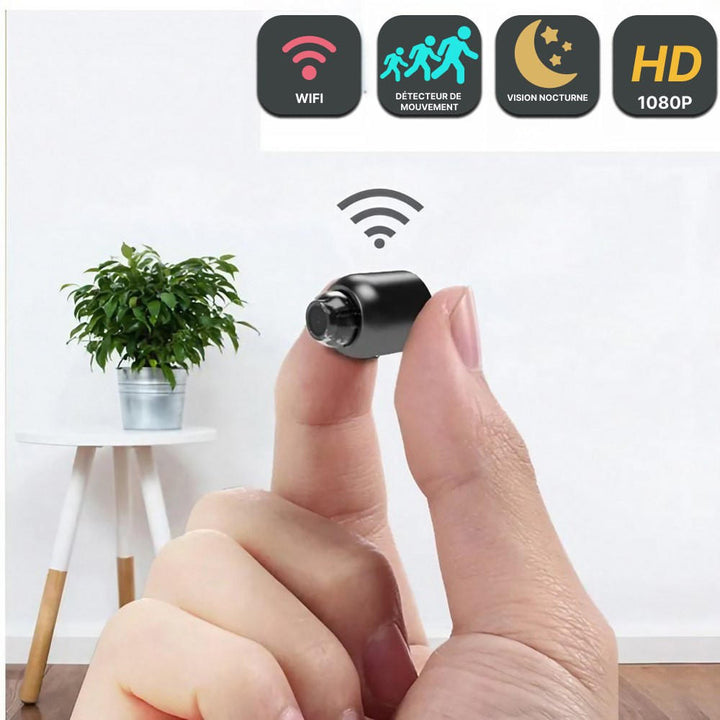 Mini caméra espion WiFi HD, surveillance discrète.  Vision nocturne, détection de mouvement. Installation facile.