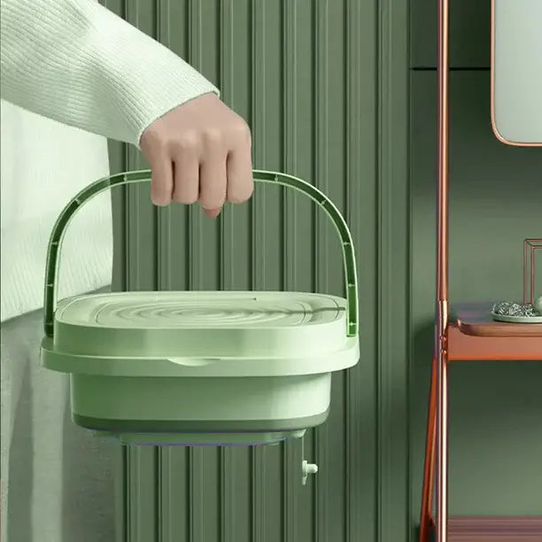"Mini machine à laver portable violette, compacte et pliable, design moderne, lavage efficace et transport facile."